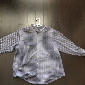 Long sleeve knit polo style shirt.